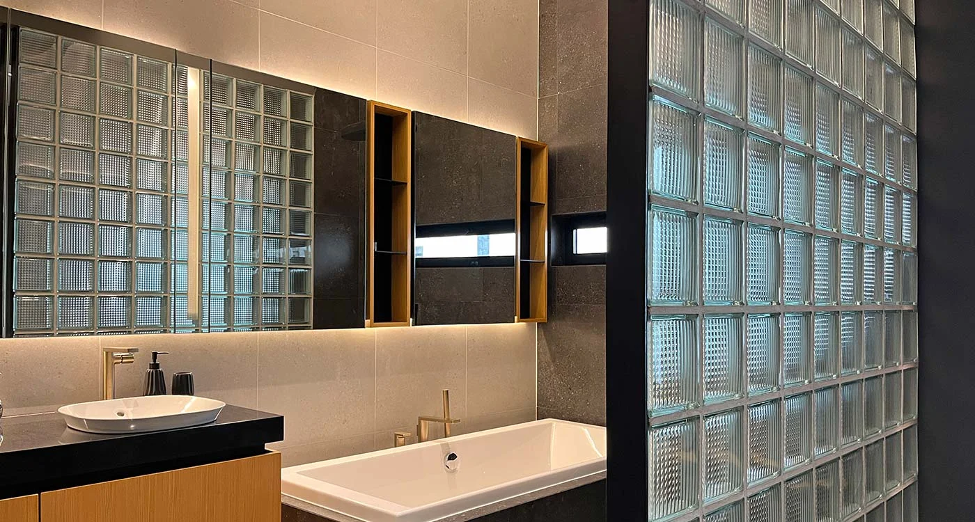 Chocolate Factory Loft bathroom with glass-block partitions